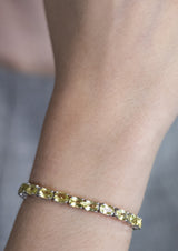 Five Stones Bracelet Citrine 6X4 — bracelet worn, close-up: sterling silver with five natural citrine stones