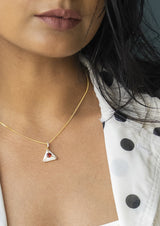 Pearl White Enamel Gold-Plated Pendant, Garnet/White Topaz — pendant worn, close-up: gold-plated 925 sterling silver with hand-applied white enamel, natural garnet and white topaz